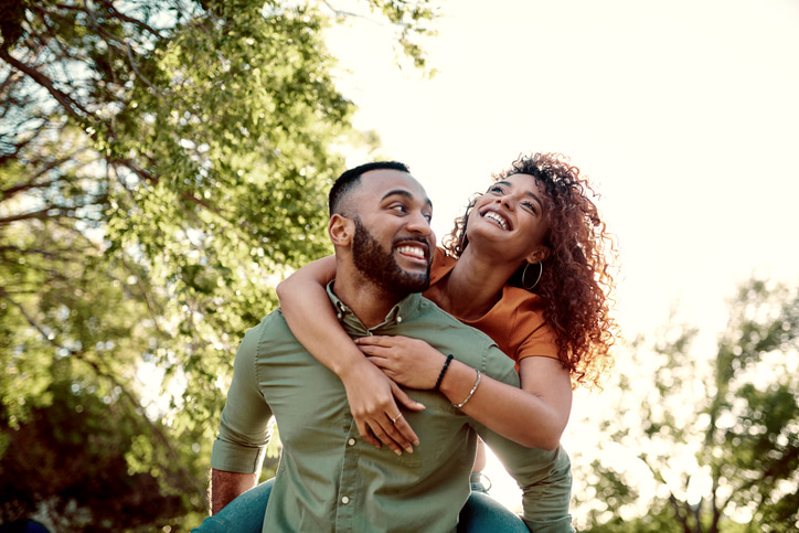 Happy Couple In A Park. Sexual Self Care Tips